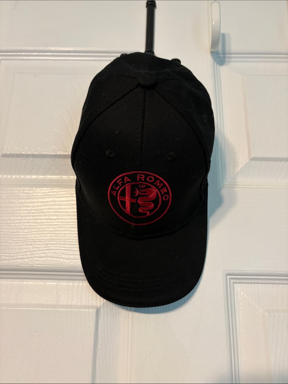 Black Baseball Cap with Red Logo